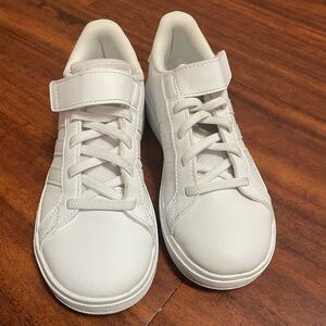 Kids white adidas sneakers